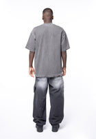 5 pocket black denim vintage wash &amp; spot