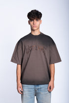 T-shirt boxy brown spray e logo strass