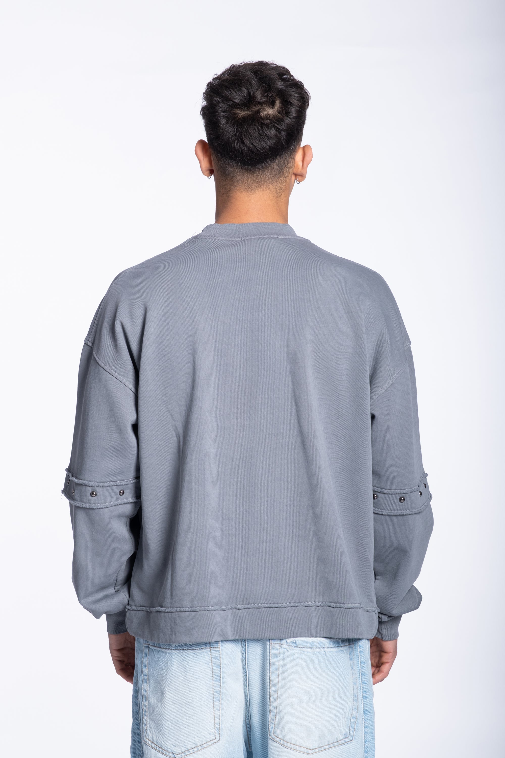 Felpa Doppia manica con borchie